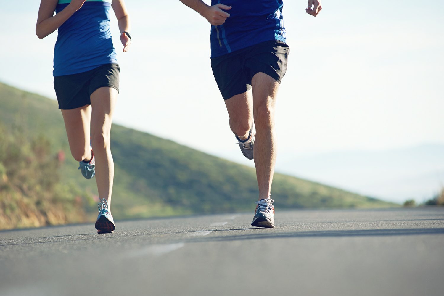 two people running