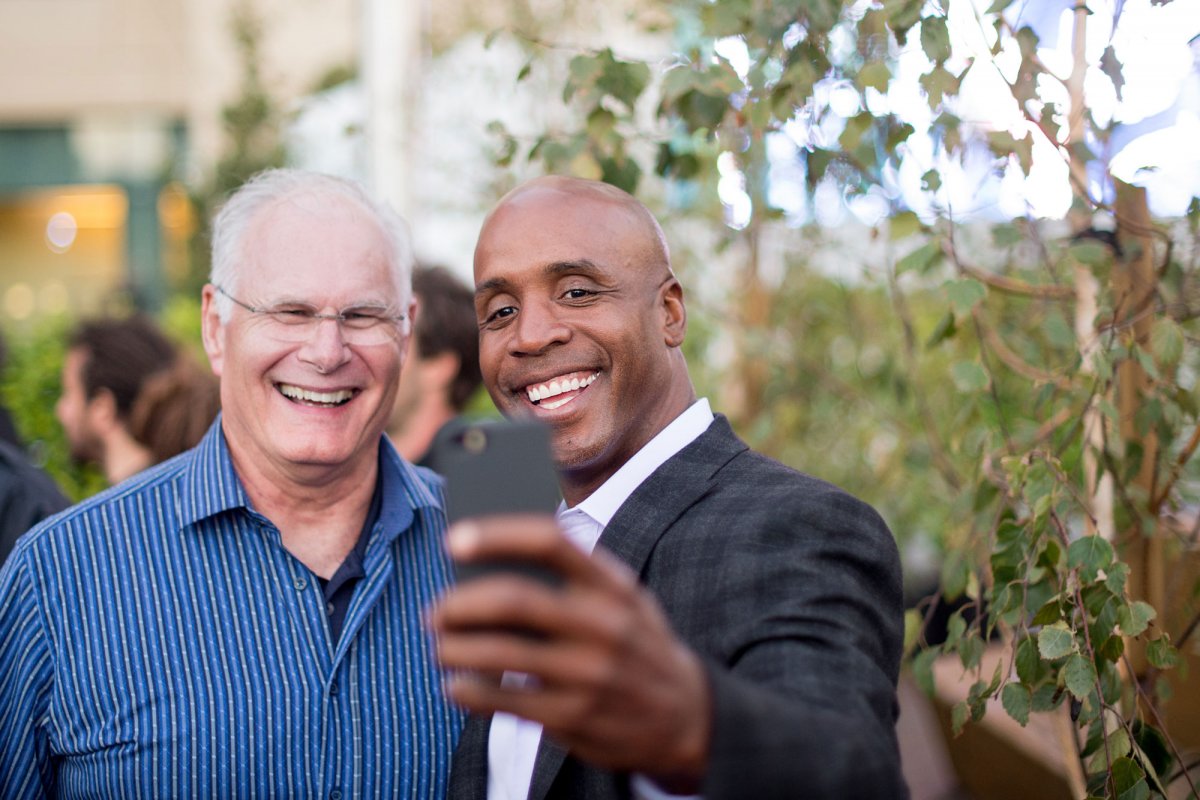 UCSF Medical Center CEO Mark Laret pauses for a selfie with San Francisco Giants home run king Barry Bonds
