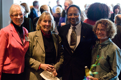 Eugene Washington posing with colleagues at his party