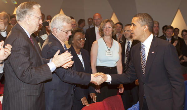 UCSF Professor Emeritus Bruce Alberts greets President Barack Obama