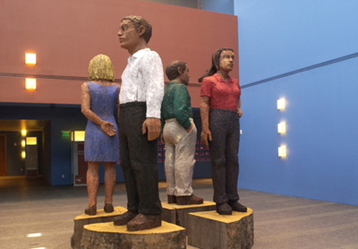 Four Large Figures by Stephan Balkenhol, 2005, Bubinga wood, acrylic paint 