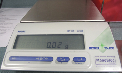 A scale is used to weigh cannabis before it is put in the vaporizer to ensure ac