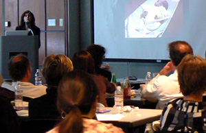 Photo of Hannah Glass explaining newborn seizure.