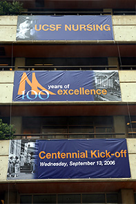 The centennial kickoff celebration culminated with the unveiling of these banners on the School of Nursing building