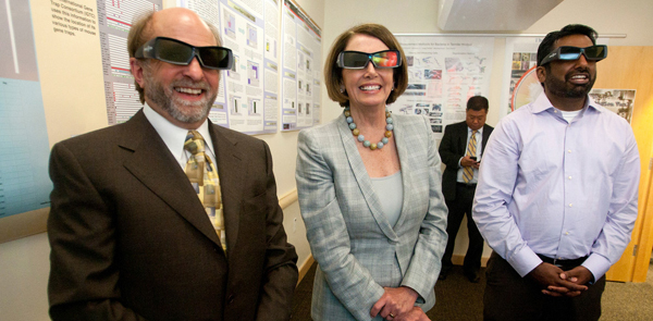 Democratic Leader Nancy Pelosi with UCSF's Tom Ferrin and Kishore Hari