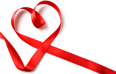 Red ribbon in the shape of a heart