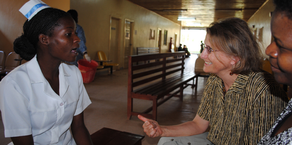 Ellen Schell talks with a nursing student in Malawi.