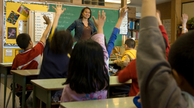 Stock image of a teacher in a classroom