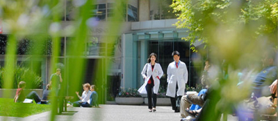 Photo of doctors walking the campus grounds