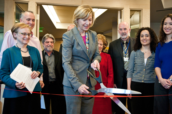 UCSF Chancellor Sue Desmond-Hellmann cuts the ribbon at the dedication ceremony