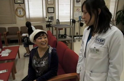 Lisa Lam, a pharmacy student at UCSF, checks in with Maggie Wong before her exam