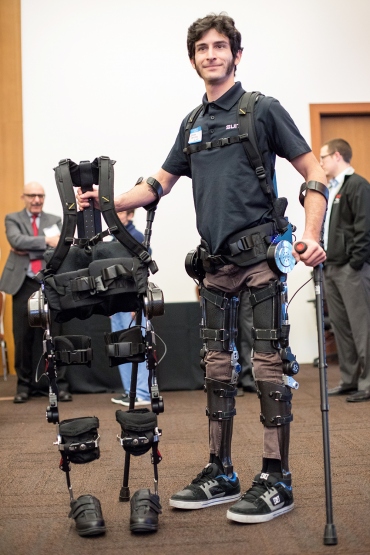 Steve Sanchez wears an exoskeleton suit that allows him to walk
