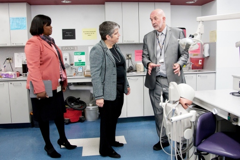 John Featherstone, Janet Napolitano and Renee Navarro tour the Pre-Clinical Dentistry Simulation