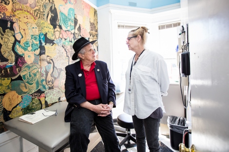 David Smith and Pam Olton talk inside the Haight Ashbury Free Clinic
