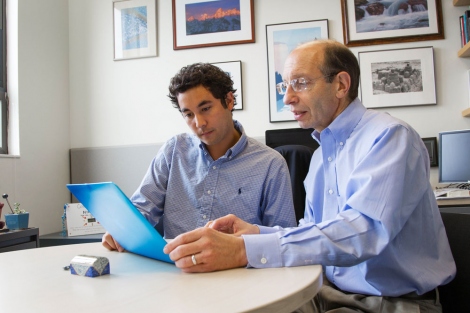 Dan Lowenstein works with a medical student in his office at Parnassus.