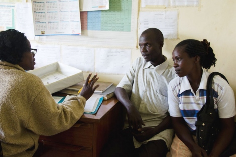 A couple consults with a health care provider at a FACES clinic
