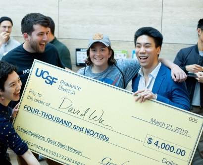 David Wu and friends celebrating with large check