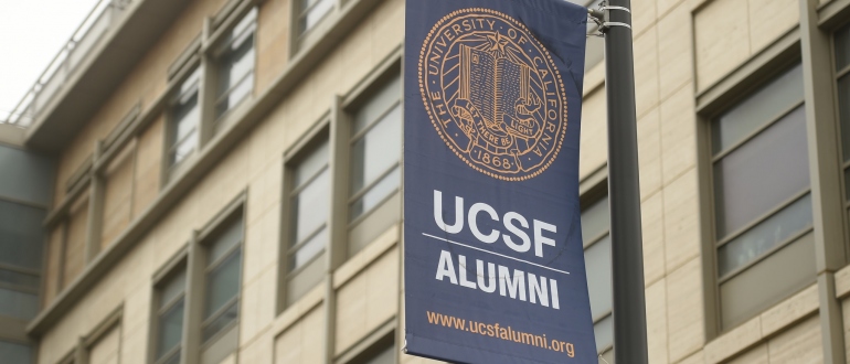 UCSF alumni banner hangs on the building.