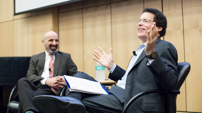 Drew Altman and Andrew Bindman talk in UCSF’s Cole Hall during a presentation about health policies under the new administration