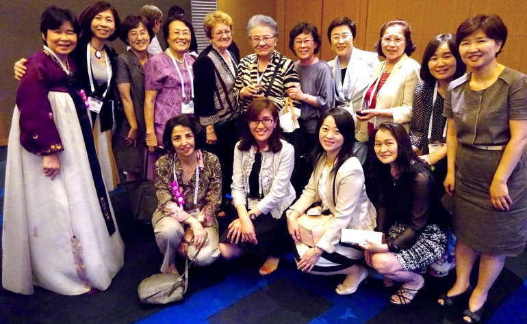 Participants pose at the reception in Seoul