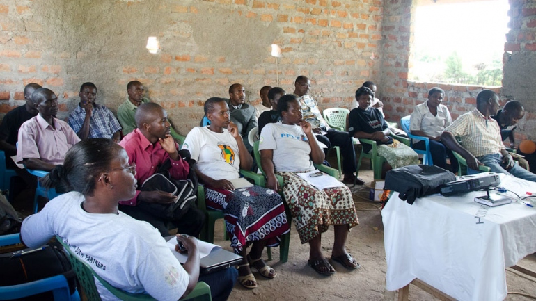 A community meeting to support HIV/AIDS health services for FACES (Family AIDS Care and Education Services), a joint program of UCSF and the Kenya Medical Research Institute.