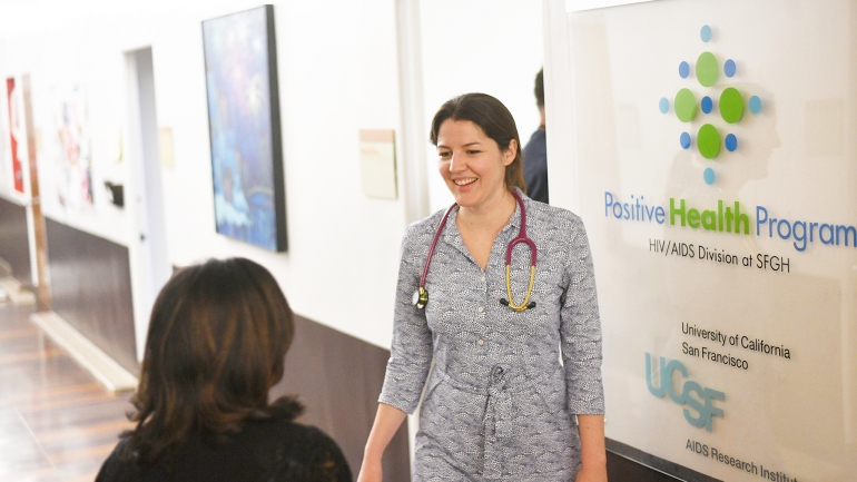 Elizabeth Imbert speaks with a co-worker at Ward 86 at Zuckerberg San Francisco General Hospital