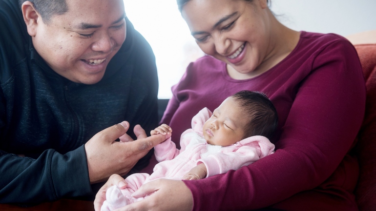 Nichelle Obar and Chris Constantino hold their baby Elianna