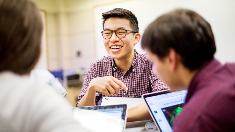 Nathan Kim studies with fellow students at UCSF's library