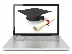 graduation cap and diploma on a laptop screen.