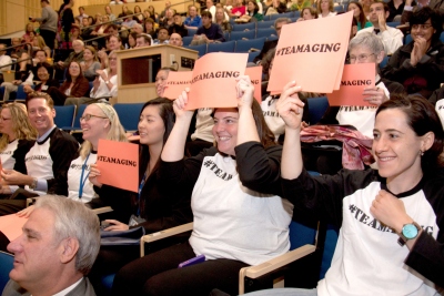 Members of Team Aging cheer as Chancellor Susan Desmond-Hellmann gives  them a shout-out during her State of the University address on Sept. 24.