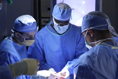 Pierre Theodore dons the Google Glass while performing thoracic surgery.