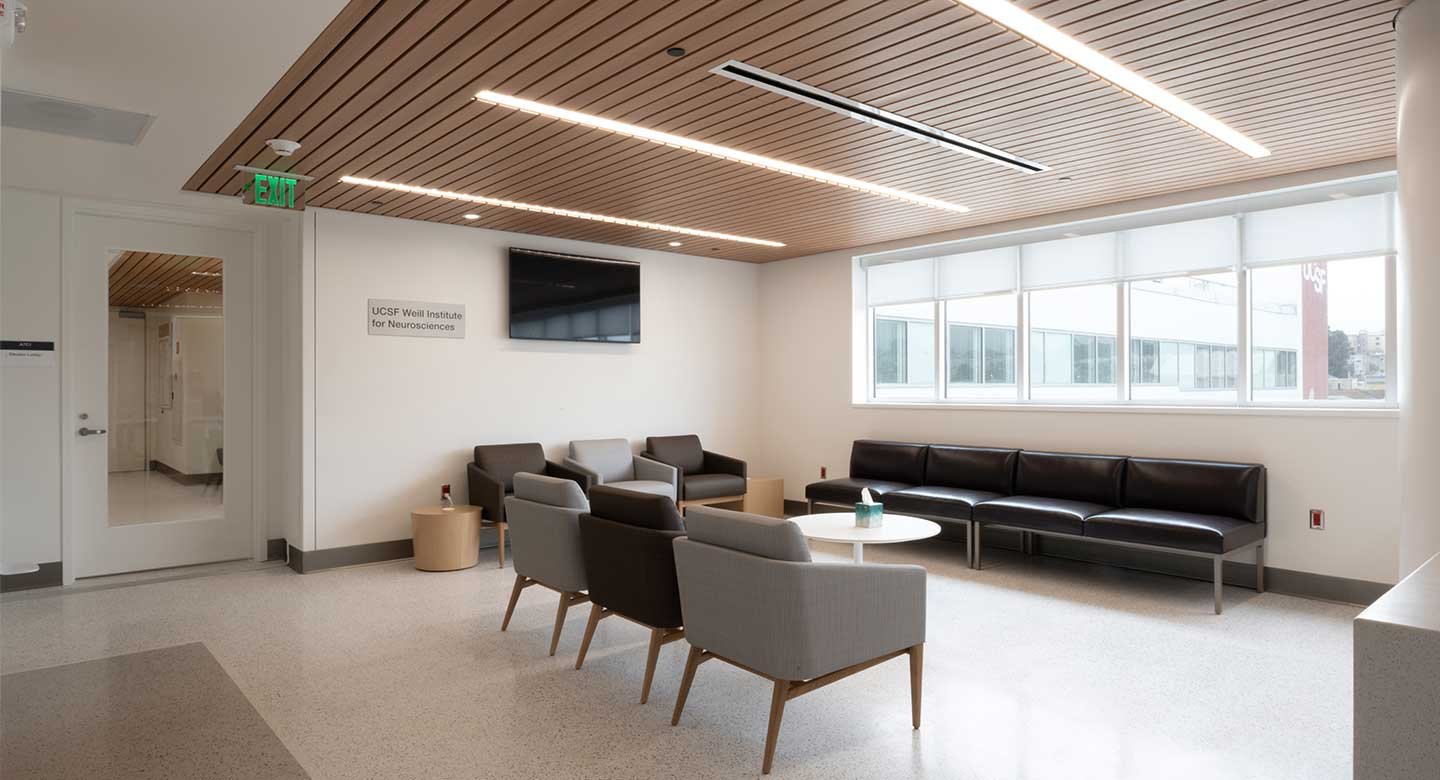 A welcoming, light-filled reception area. A large window lets in light and views of San Francisco.
