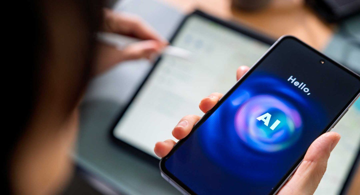 A man uses AI on his cell phone.