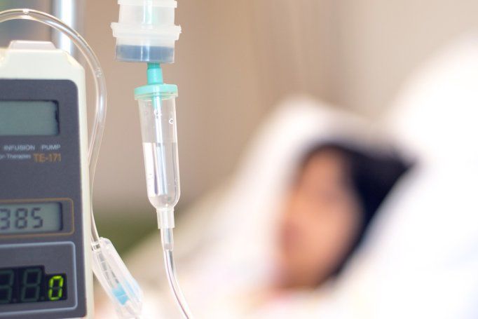 stock images shows IV drip and pediatric patient in a hospital bed