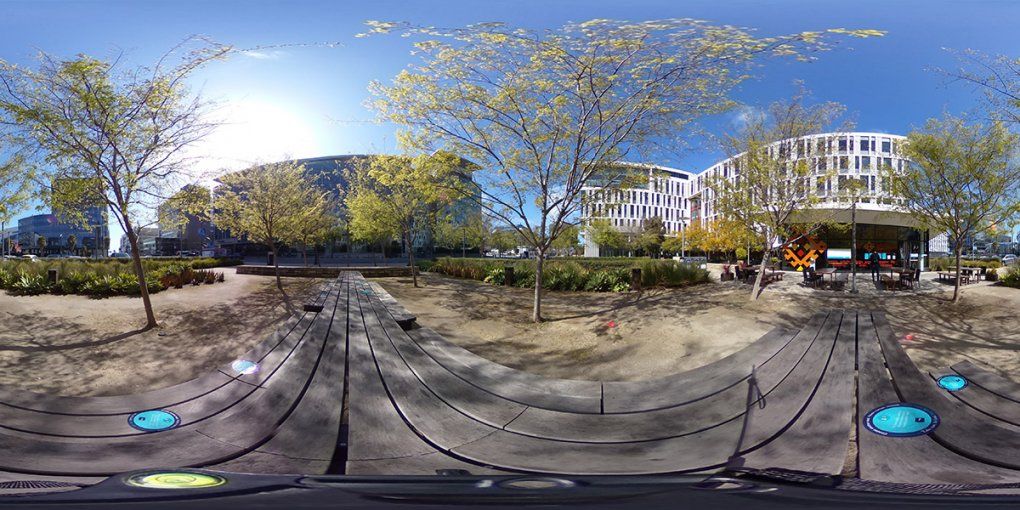 Trees sit between rows of inviting benches and tables