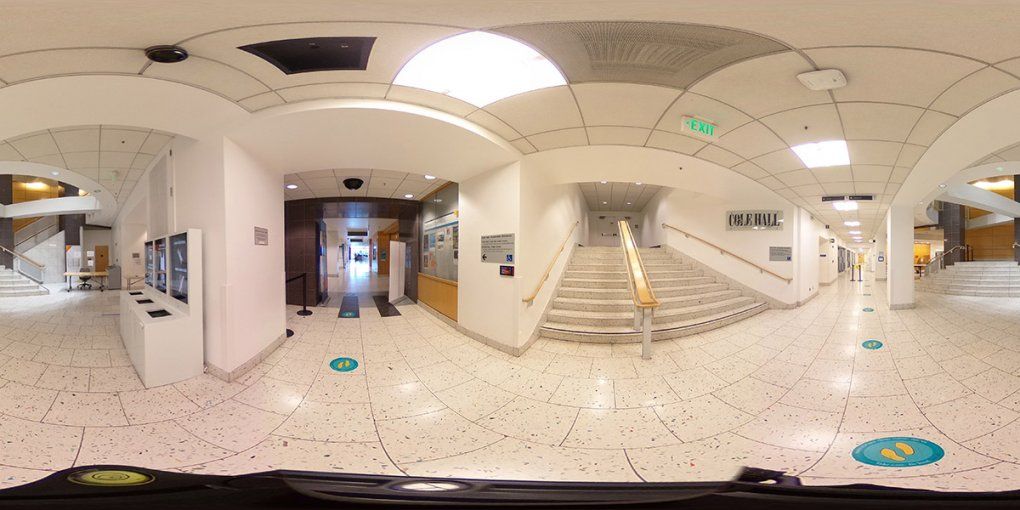 The central staircase sits down a hallway outside of Cole Hall Auditorium
