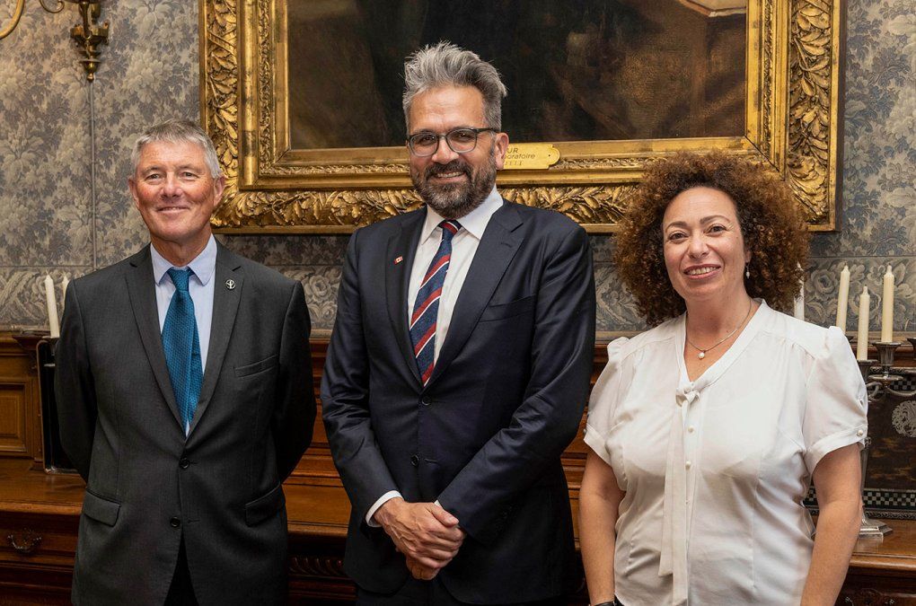 Stewart Cole, President of Institut Pasteur stands on the left; Negan Krogan of UCSF stands in the Center, and Carla Saleh stands on the right