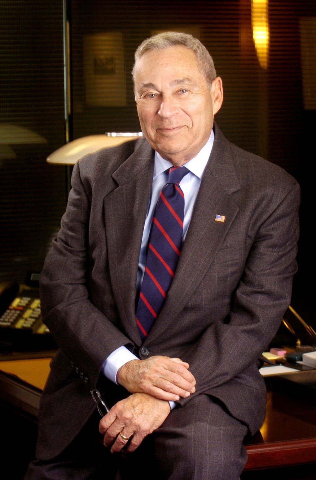 A portrait of Richard Rosenberg wearing a suit