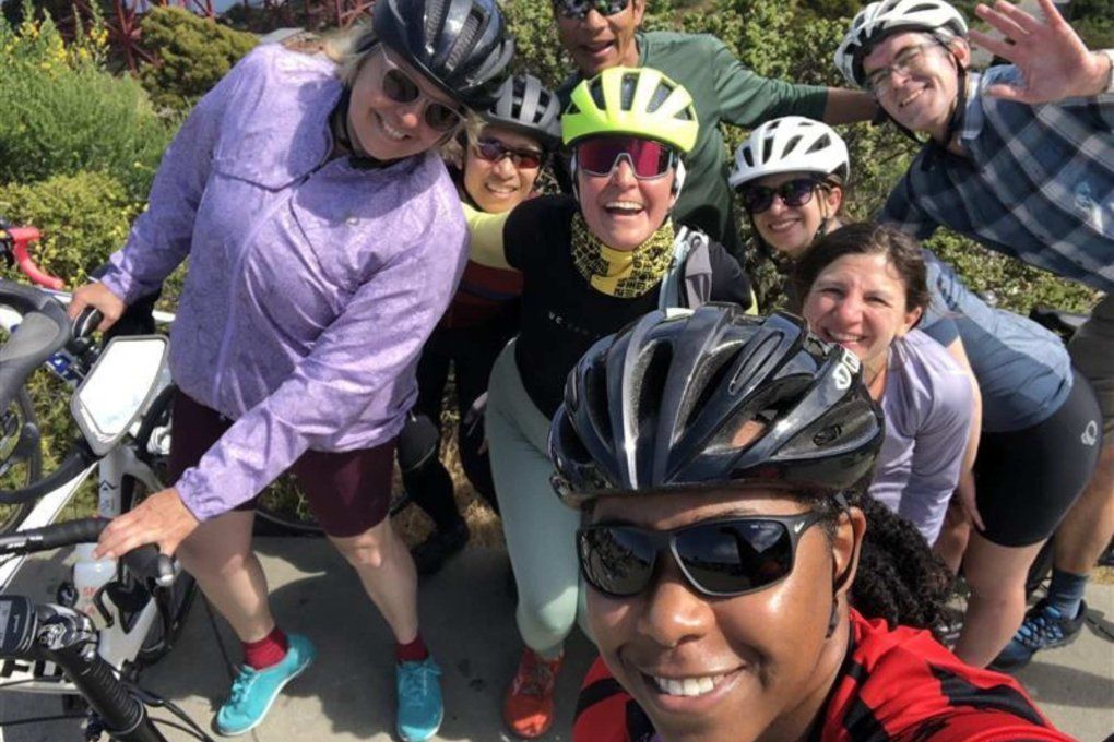 group of bicyclists take selfie