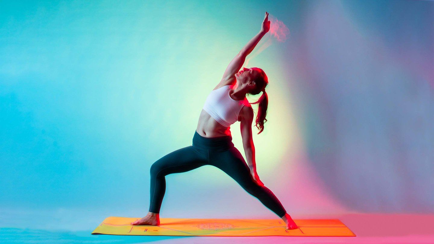 Brooke Schultz does a yoga pose.