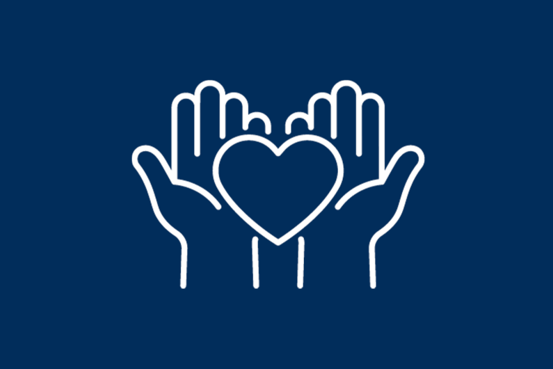 An icon of hands and heart on navy background.