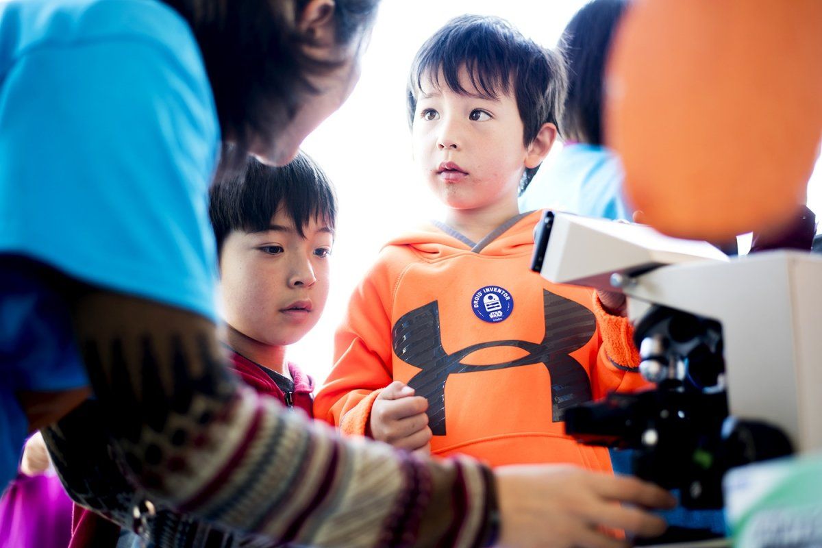 Avon Gorrell 5 and brother Isaac Gorrell, 8, learn about cell division at a UCSF exhibit