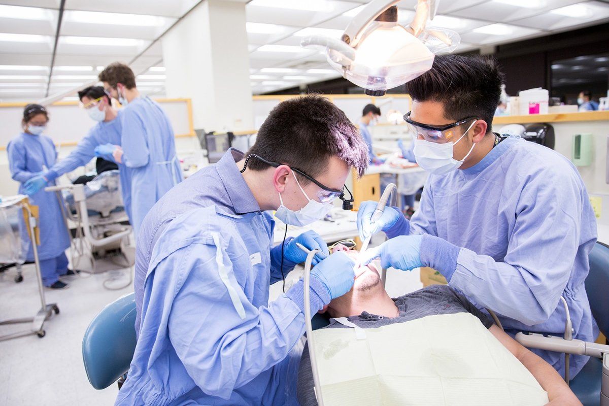 Dental Center students providing a check up