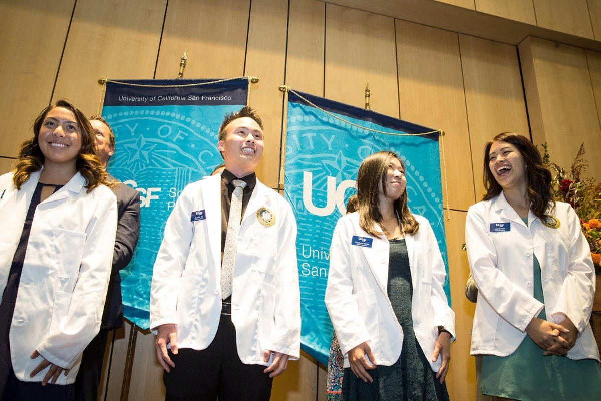 School of Pharmacy students receive their white coats during a ceremony