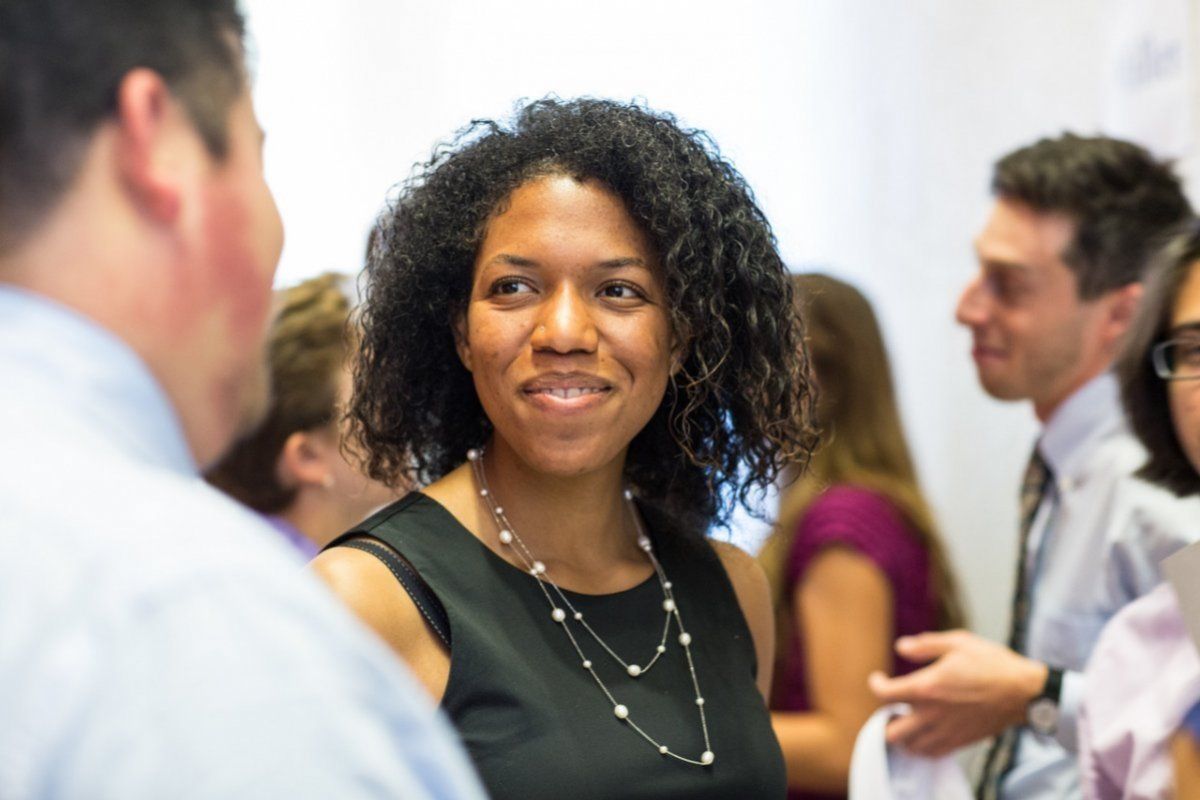 students talk after white coat ceremony 