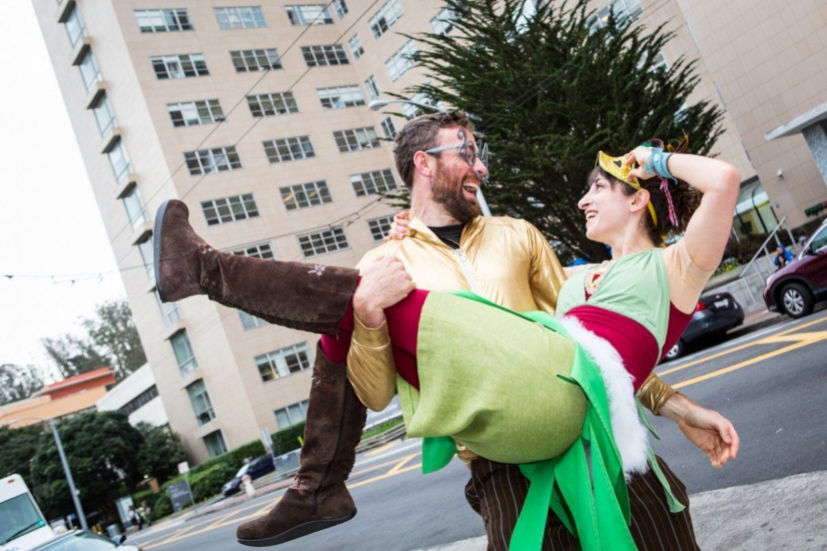 Man picking up a woman 