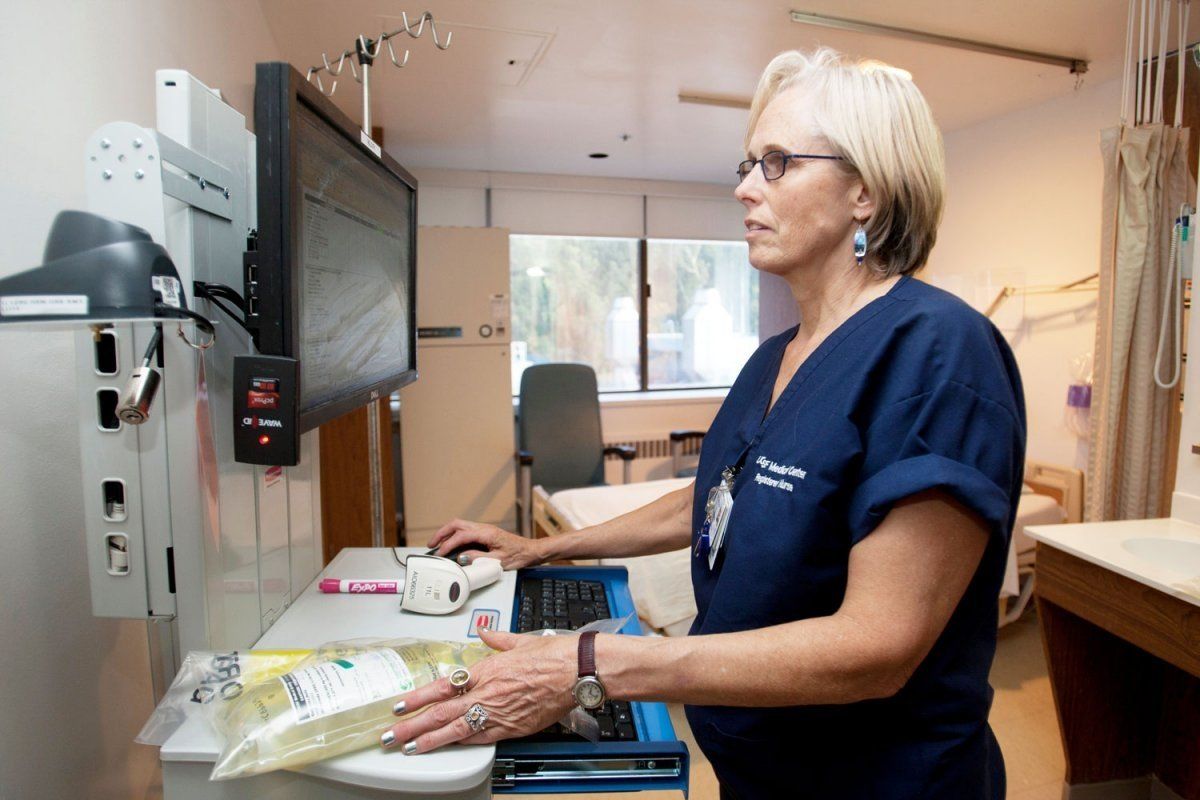 Doctor working on computer in medical center 