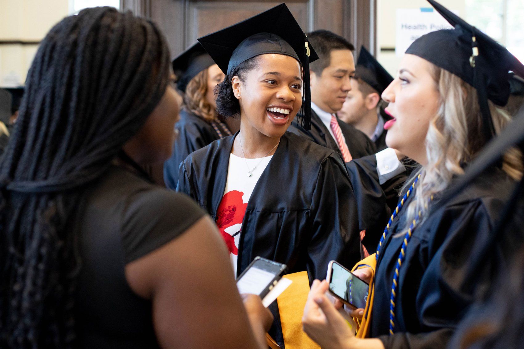 Students talking at Grad Div Commencement 2019