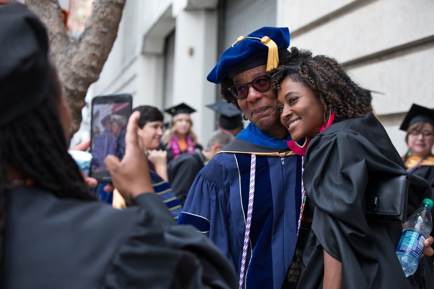 Professor with student at graduation