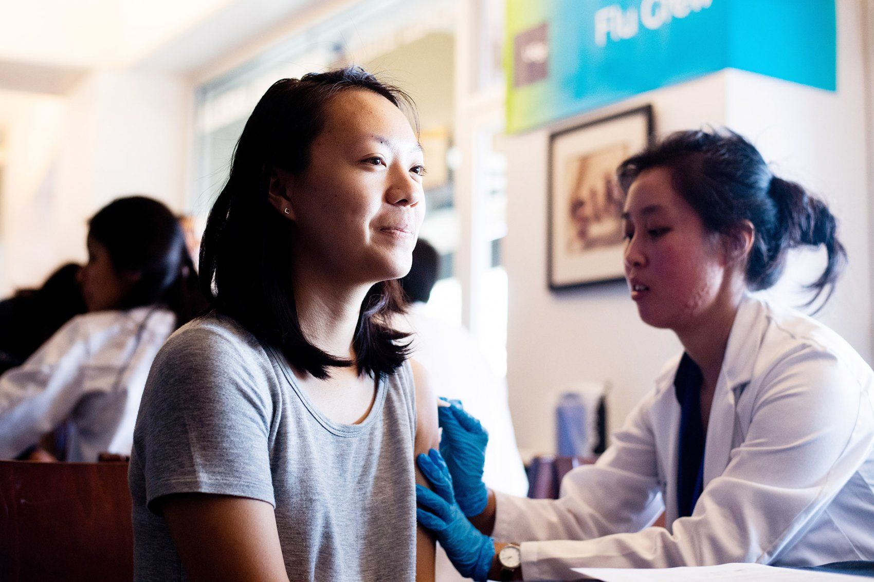 a woman gets a flu shot